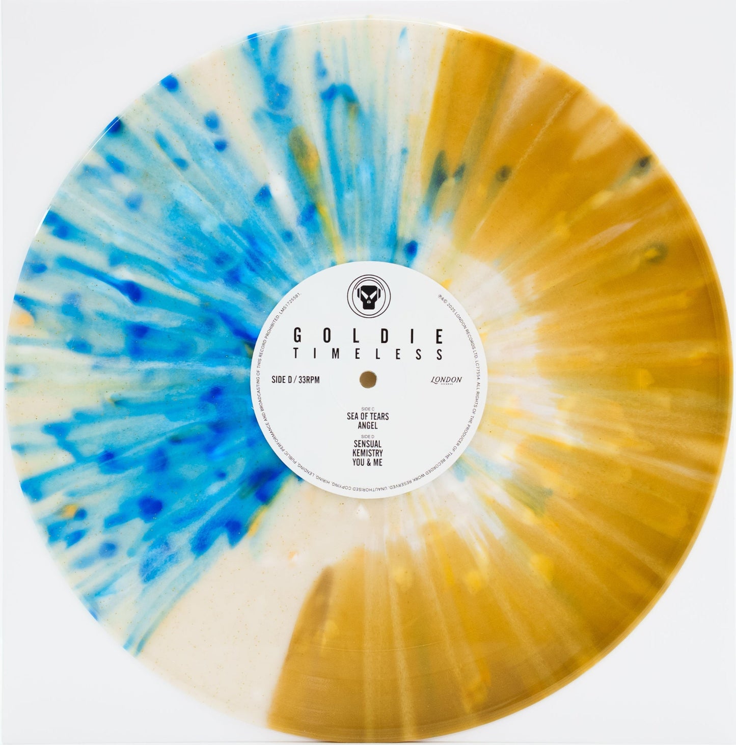 Vinyl record with a colorful swirl design and 'Goldie Timeless' label on a white background