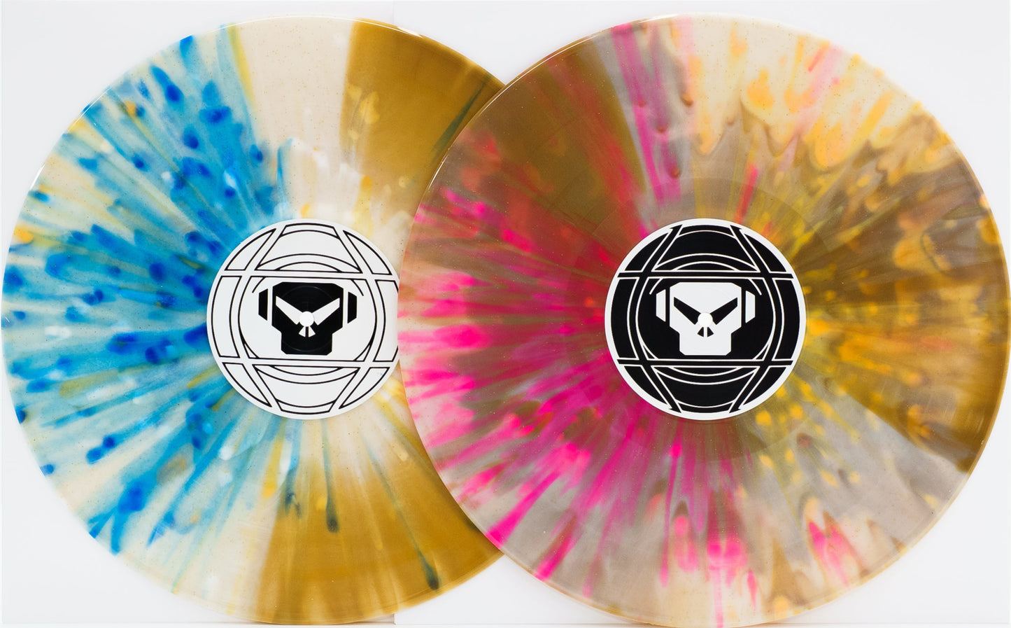 Two colorful Goldie Timeless vinyl records with a logo on a white background
